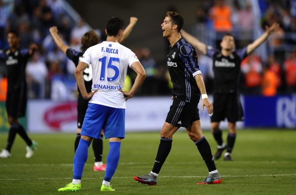 Real Madrid's Cristiano Ronaldo celebrates at the end of a Spanish La Liga soccer match between Malaga and Real Madrid in Malaga, Spain, Sunday, May 21, 2017. Real Madrid wins the Spanish league for the first time in five years, avoiding its biggest title drought since the 1980s. (AP Photo/Daniel Tejedor)