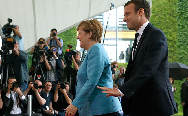 Merkel y Macron. Foto: EFE