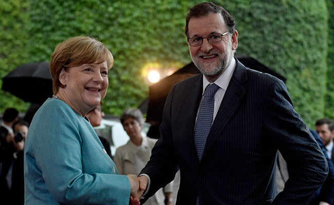 Merkel recibe a Rajoy. Foto: AFP