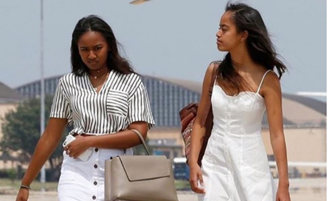 Esposa Michelle y sus hijas Malia y Sasha