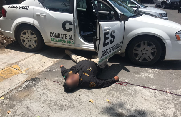 Asesinan a dos policías estatales en Naucalpan Asesinan a dos policías estatales en Naucalpan